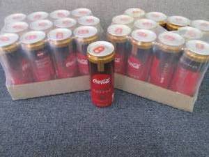 lot 284 image: 2-12 pks Coca Cola Caramel with Cof...