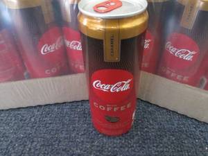 lot 290 image: 2-12 pks Coca Cola Caramel with Cof...