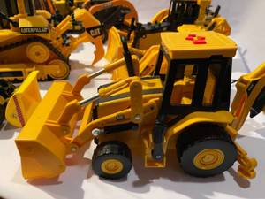 lot 103 image: Vintage Plastic Tractor Toys