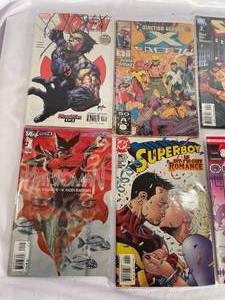 lot 147 image: 8 Vintage Marvel And DC Comic Books