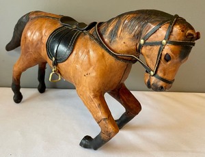 lot 100 image: Wooden Horse Carvings with Leather Accents