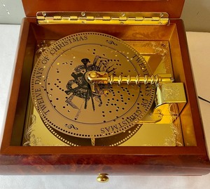 lot 145 image: 12 Days Of Christmas Music Box in Glass Covered  Wooden Case