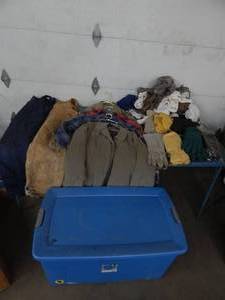 lot 21 image: Large Lot Of Mens Winter Gear ML Bibs, Jackets, Insulated Flannels, Hat, Gloves, Long Underwear, With Tote & Lid
