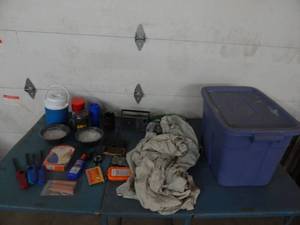 lot 11 image: Assorted Camping Supplies, Rain Suits, Bug Repellant, Cups, Compass, More, Includes Tote With Lid