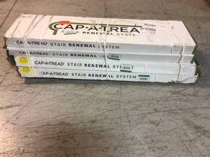 Lot of Lighthouse Oak 47 in. L x 12-18 in. D x 1-1116 in. H Vinyl Overlay to Cover Stairs 1 in. Thick by Cap A Tread Customer Returns See Pictures