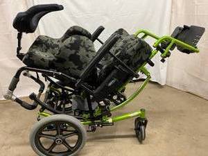 lot 5 image: MSRP $3500 Invacare Solara 3G Custom Tilt-In-Space Lime Green Wheelchair Heavy Duty Frame Yet Light Weight This Amazing Chair Comes With A GI Joe Army Camo Print Cushion - 300lb Capacity - Great Condition
