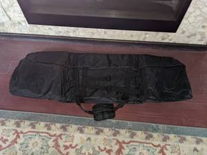 lot 159 image: Large Black Canvas Sports EquipmentDuffel Bag - 54 x 18 x 7