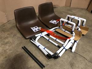 lot 30 image: Walker Edison Furniture Company Wasatch 24 in. Brown Low Back Metal Frame Counter Height Bar Stool with Faux Leather Seat (Set of 2)- good condition - review all pictures