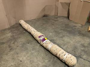 lot 33 image: Home Decorators Collection Bayonna Natural Tan 8 ft. x 10 ft. Solid Area Rug - good condition - review all pictures