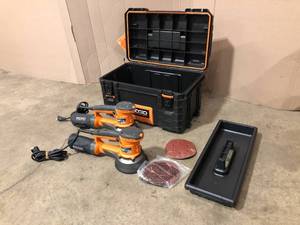 lot 38 image: RIDGID 22 in. Pro Gear Cart Tool Box in Black & (2) 4 Amp Corded 6 in. Variable-Speed Dual Random Orbital Sander with AIRGUARD Technology- used - in working condition - review all pictures