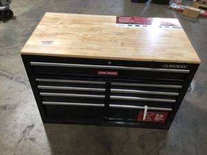 lot 10 image: Husky 42 in. W x 18.1 in. D Standard Duty 10-Drawer Mobile Workbench Tool Chest with Solid Wood Top in Gloss Red - Has Damage and might be difficult to open with keys - review all pictures