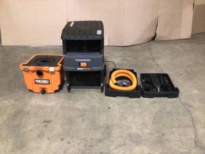 lot 31 image: RIDGID 11 Gal. 6.5-Peak HP Smart Cart WetDry Shop Vacuum with Fine Dust Filter, Professional Hose and Accessories - good condition - review all pictures