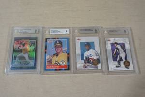 lot 79 image: Graded Baseball Cards - McGwire, Reyes, Rodriguez, Prinz