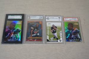 lot 81 image: Graded Football Cards - Javon Kearse, Couch, Russell