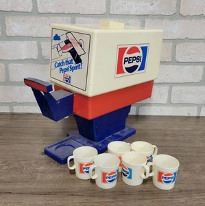 lot 1435 image: Vintage Trim Toys PEPSI Dispenser, w Bottle and Cups