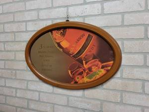 lot 1486 image: Paul Masson Brandy Oval Mirror - 24 Across