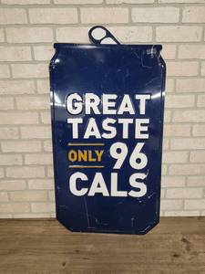 lot 1608 image: Metal Embossed Miller Beer Can Sign (36 x 19)