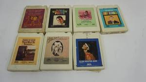 8 track cassettes with artists including Eddy Arnold, Charley Pride, Charlie Rich etc.