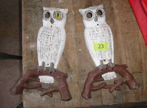 lot 23 image: Two cast iron owls, were part of a fireplace stand at one time