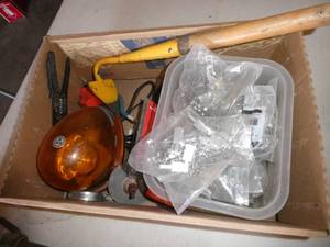 lot 42 image: Box of misc tools, pick head, and safety light