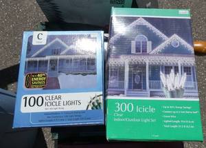 lot 64 image: Christmas plates and 2 boxes of icicle lights