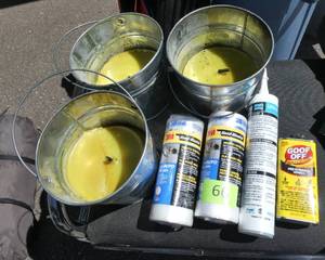 lot 66 image: Citronella candles and masking platic, sealant, goof off
