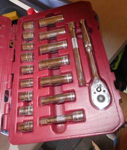 lot 77 image: Tote of ball hitches, socket set, tree stand