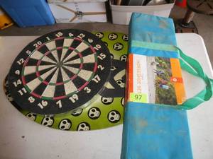 lot 97 image: Horseshoe set, dart board and low wave surfboard