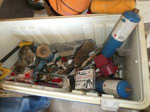 lot 102 image: Blue cooler full of plumbing tools, Grundfos pump etc