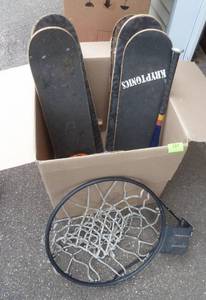 lot 127 image: 5 Skateboards, basketball hoop and ball and a couple baseball bats and gloves