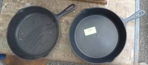 lot 144 image: Two very new (one for sure is unused) cast iron fry pans