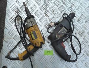 lot 148 image: 2 drills, one needs a new cord and the other smells like the brushes are going