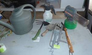 lot 174 image: mole trap, bug fogger, sprinkler can