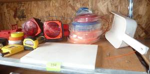 lot 194 image: Shelf with lots of weed whip string, tail lights, tape measure, parts bin