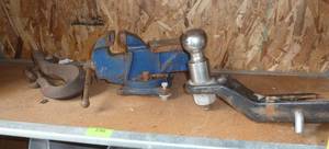 lot 196 image: Shelf with trailer hitch, vice and large chain hook