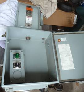 lot 202 image: electrical enclosure with safety switch and also a start stop