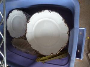 lot 209 image: tote of white plates with silver edge and corn cob dishes
