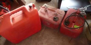 lot 231 image: 2 boat gas cans (bad hose) and a plastic gas can