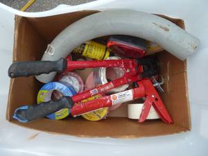 lot 236 image: lot of various tape, crimper, caulk gun, sealant