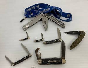 lot 28 image: Group of Vintage Pocket Knives and Leatherman Rev