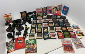 lot 41 image: Vintage Atari Video Games, Controllers