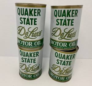 lot 44 image: Vintage Quaker State DeLuxe Oil Cans