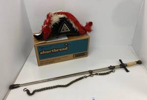 lot 13 image: Vintage Masonic hat and Sword