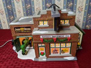 lot 181 image: RETIRED Vintage Department 56 The Original Snow Village Abners Implement Co.
