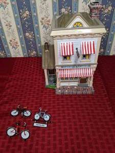 lot 197 image: RETIRED Vintage Department 56 The Original Snow Village Wright Bike Shop