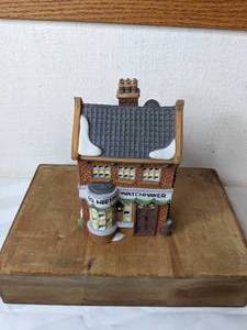 lot 498 image: Vintage Department 56 Heritage Village Collection Geo Weeton Watchmaker Dickens Village Series