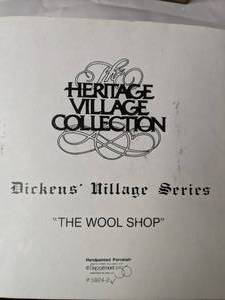 lot 89 image: Department 56 Heritage Village Collection Dickens Village Series The Wool Shop, 1988