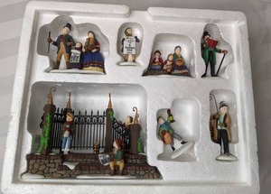 lot 139 image: Department 56 Heritage Village Collection Dickens Village Series A Christmas Carol Reading By Charles Dickens Set of 7 Porcelain Accessories