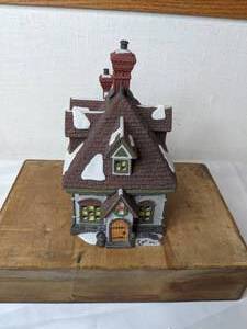 lot 169 image: RETIRED Vintage Department 56 Heritage Village Collection W.M. Wheat Cakes & Pudding Dickens Village Series