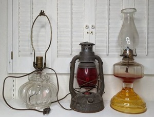 lot 50 image: Trio of Vintage Lamps Glass Base Electric, Dietz Railroad Lantern and Glass Hurricane Lamp